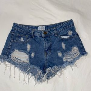 Denim cheeky ripped shorts